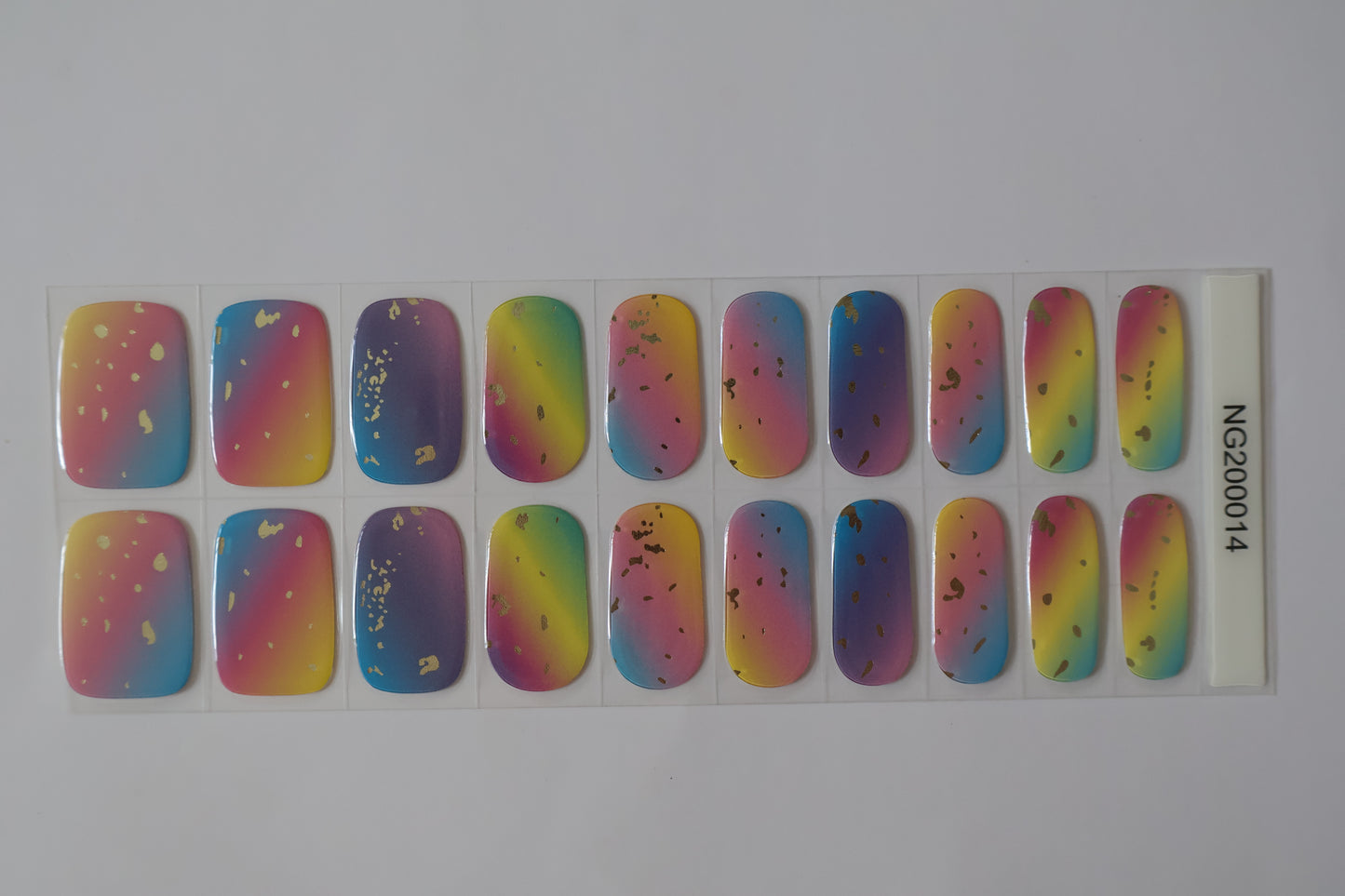 Close up of Rainbow Stylin gel nails with glossy rainbow gradient finish