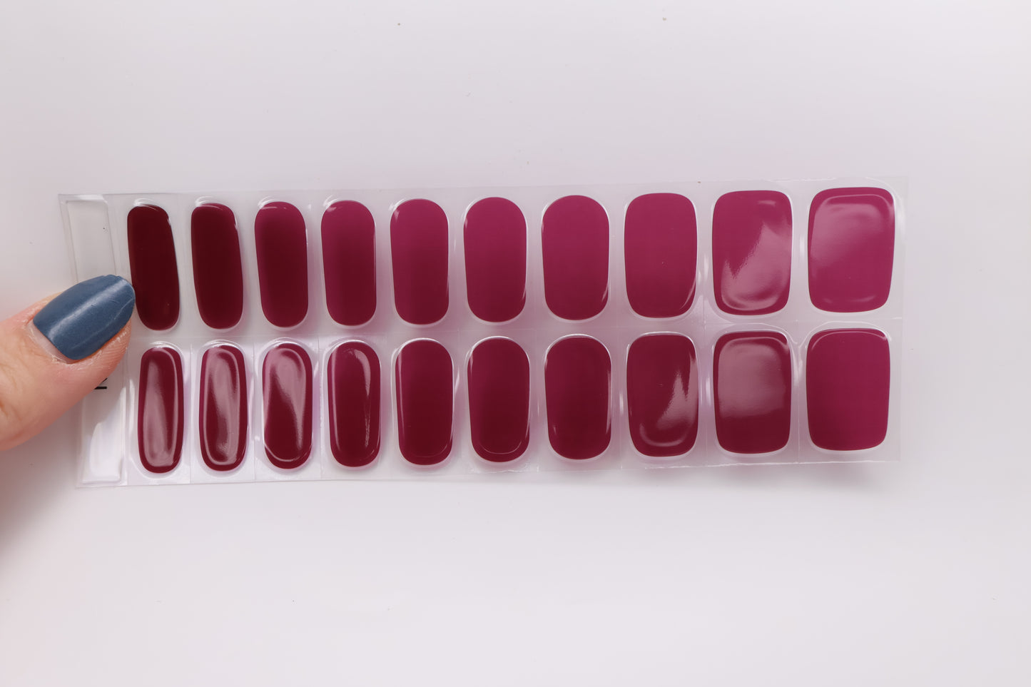 Close up of Velvet Bliss semi-cured gel nail stickers sheet with multiple sizes for perfect fit