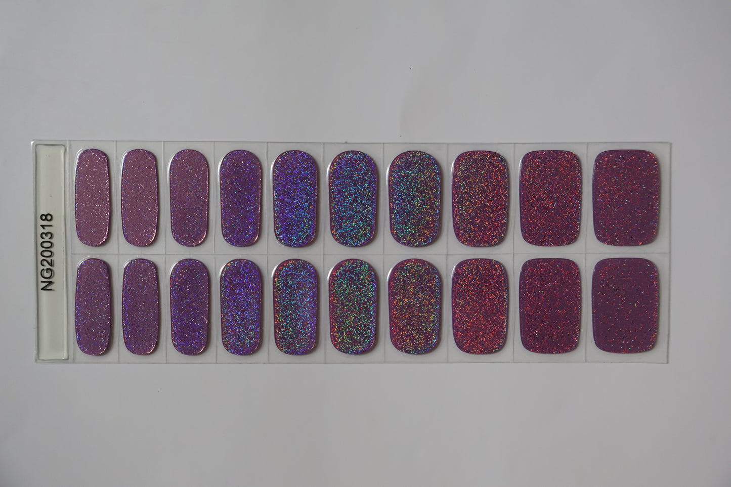 Close up of Purple glitter gel nail stickers sheet with multiple sizes for perfect fit