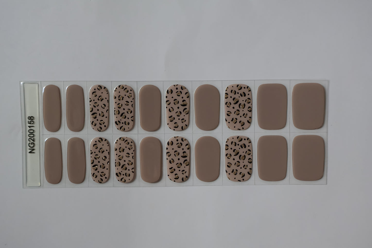 Close up of Leopard Luxe print Semi-cured nail stickers sheet with multiple sizes for perfect fit